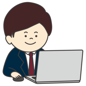 パソコンを使って仕事をする会社員（男性/笑顔）