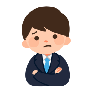 考え事をするスーツの男性