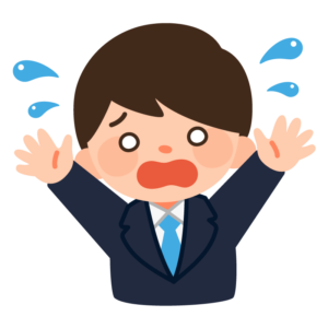 びっくりするスーツの男性